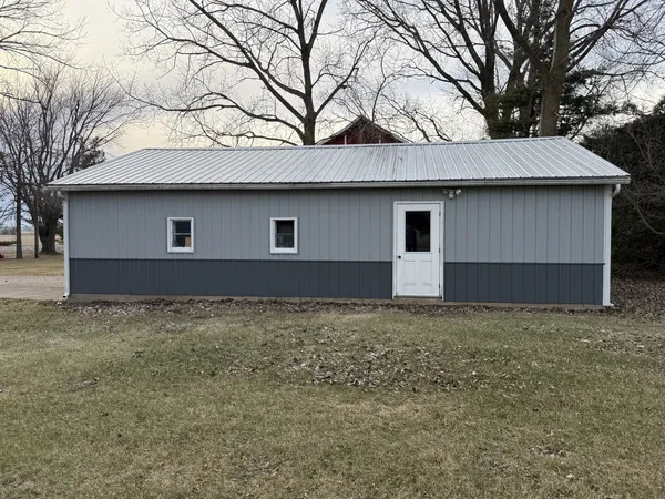 a outdoor view of a house with a yard