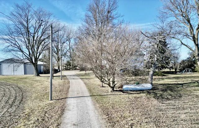 a view of a back yard of the house