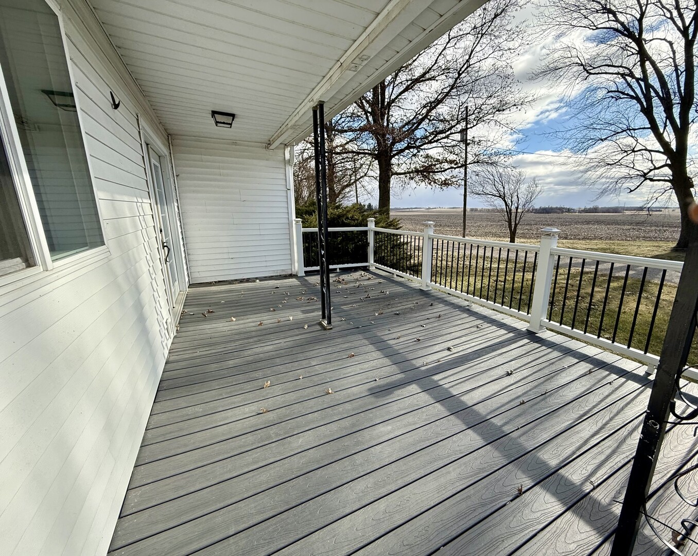 2932 Highway 17 Galva, IL 61434 - Photo 19 of 51 a view of couches on the deck with wooden floor
