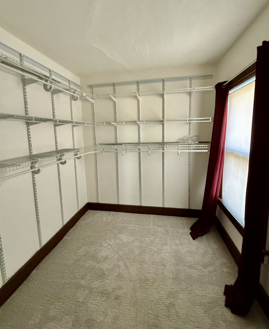 2932 Highway 17 Galva, IL 61434 - Photo 46 of 51 a view of a room with racks on the wall and a window