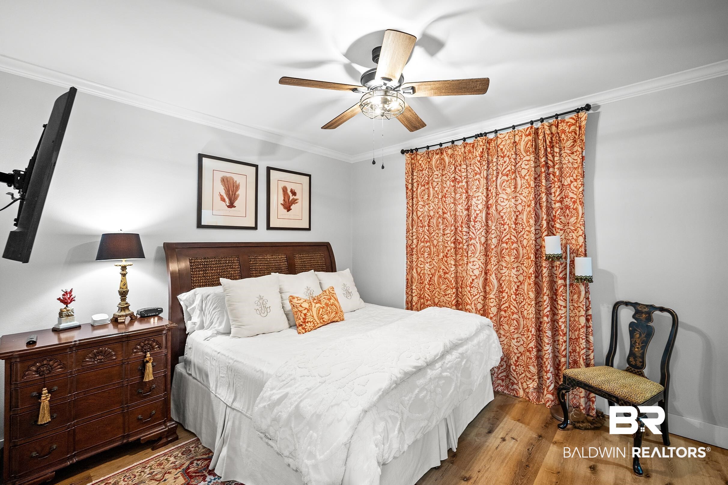 8490 Bay View Drive Foley, AL 36535 - Photo 55 of 67 Bedroom with ornamental molding, wood finished floors, and ceiling fan