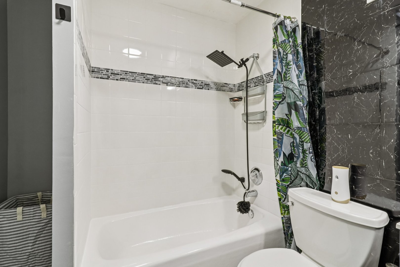 1405 East Central Road, Unit 122C Arlington Heights, IL 60005 - Photo 23 of 41 a bathroom with a toilet and a bathtub