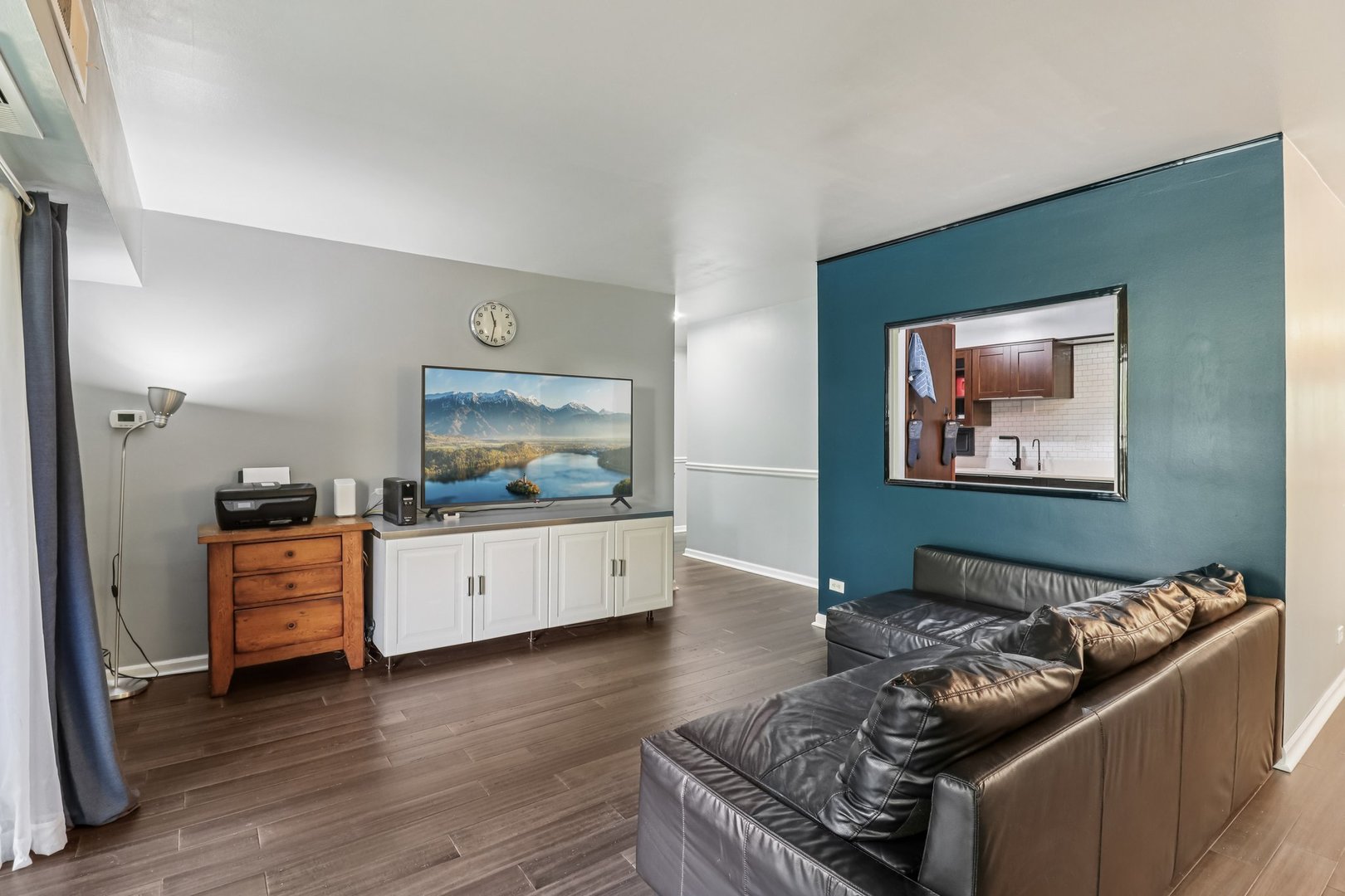 1405 East Central Road, Unit 122C Arlington Heights, IL 60005 - Photo 8 of 41 a living room with furniture and wooden floor