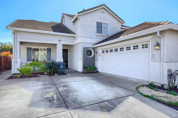 a view of a house with a patio