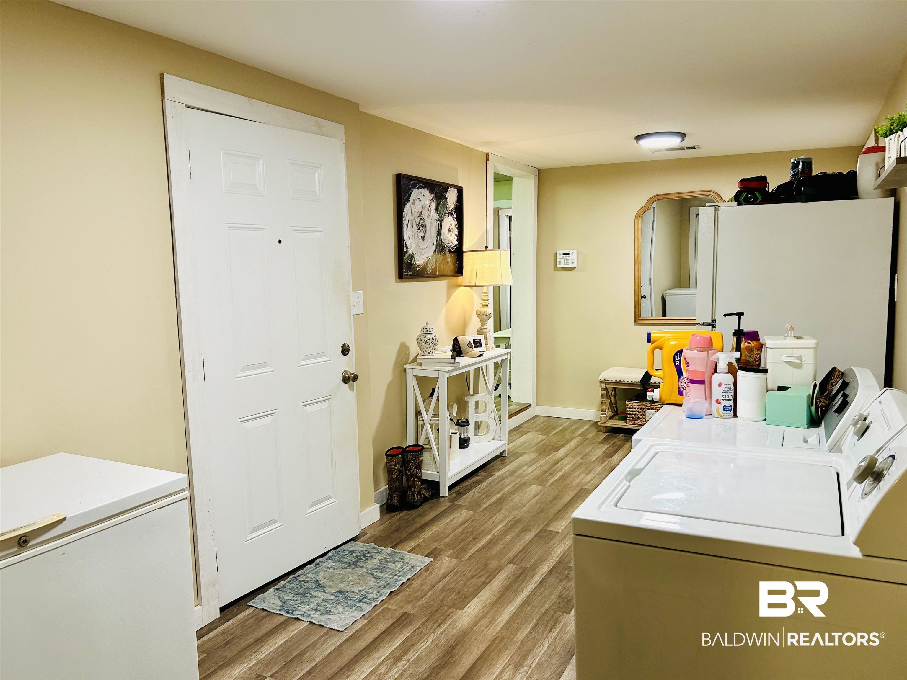3850 Newman Road Mobile, AL 36695 - Photo 24 of 27 Laundry area featuring light hardwood / wood-style floors and separate washer and dryer