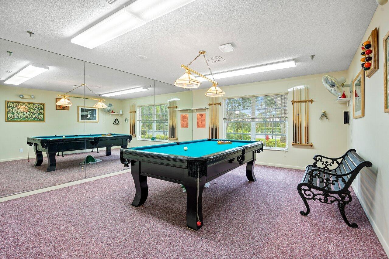 8299 Springlake Drive, Unit B Boca Raton, FL 33496 - Photo 31 of 31 a room with furniture pool table and windows