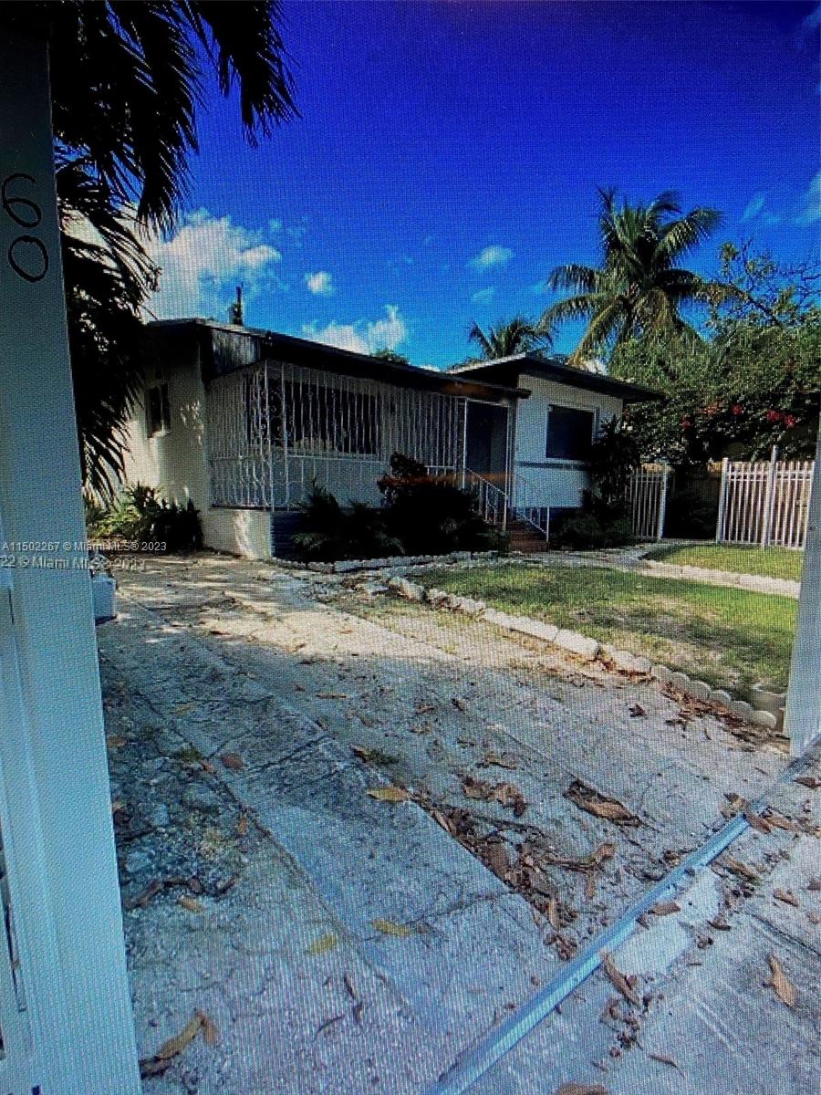 Buena Vista Miami, FL 33137 - Photo 2 of 4 a view of a house with a yard
