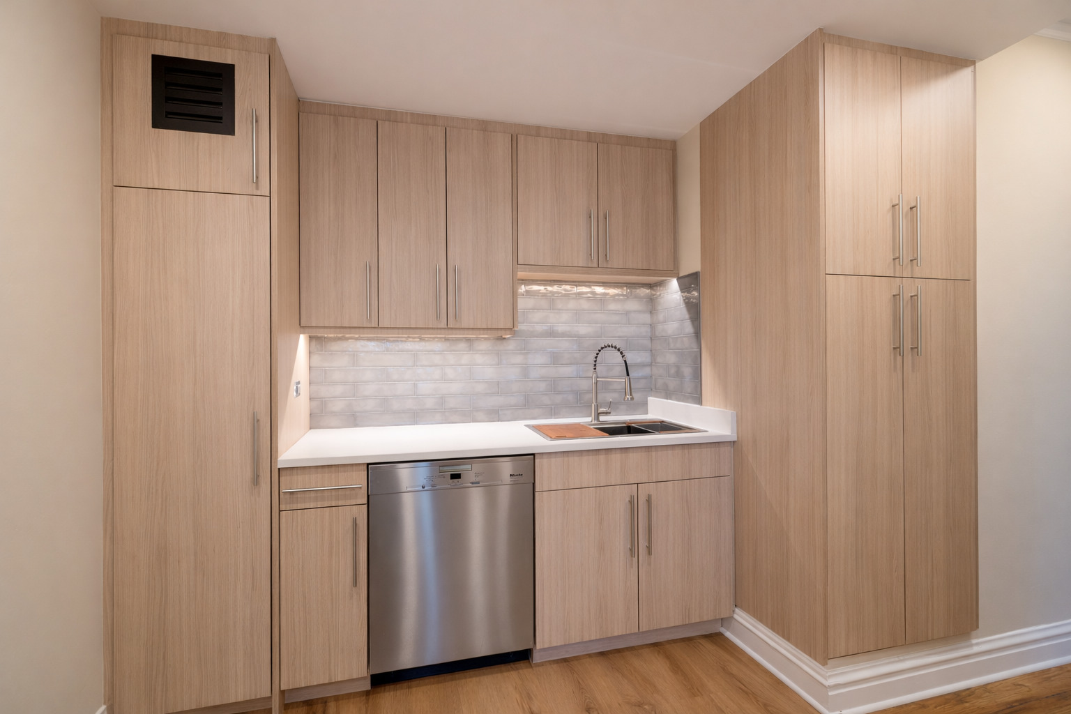 1765 East 55th Street, Unit E1 Chicago, IL 60637 - Photo 11 of 18 a kitchen with a sink and cabinets
