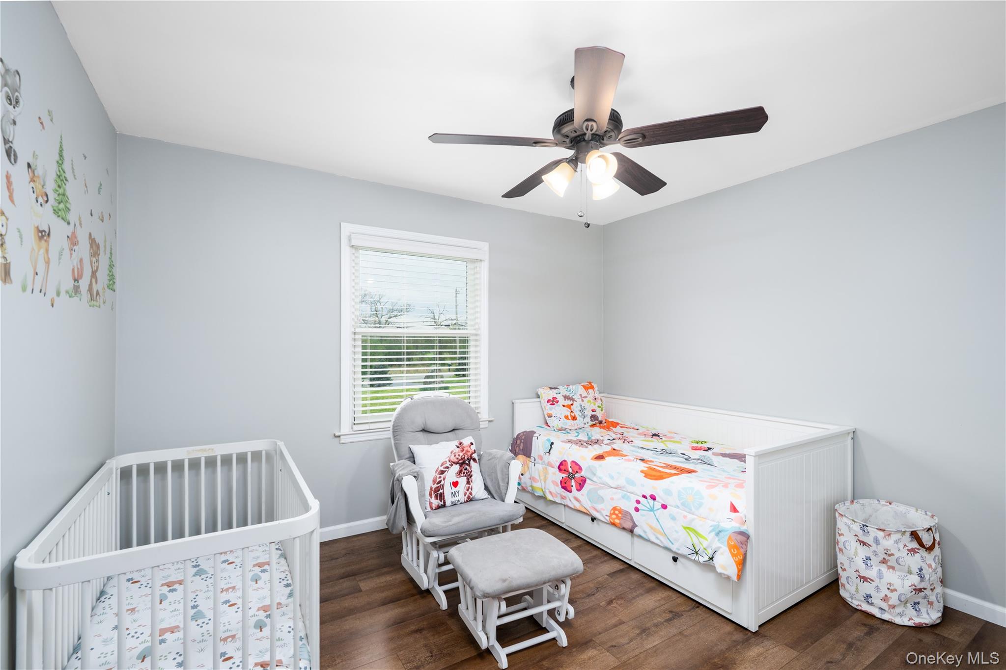 41 Diddell Road Wappingers Falls, NY 12590 - Photo 17 of 44 Bedroom 1-featuring wood-flooring, a single window with blinds, and a ceiling fan with integrated lighting