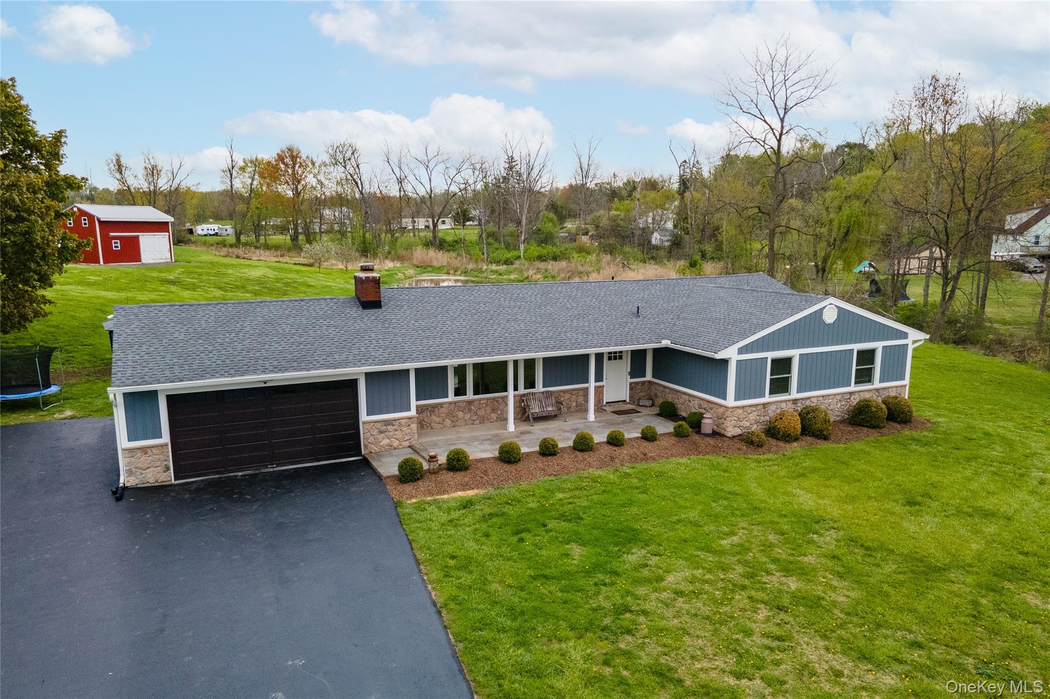 41 Diddell Road Wappingers Falls, NY 12590 - Photo 2 of 44 Ranch-style residence featuring royal composite gray-blue siding and stone veneer accents