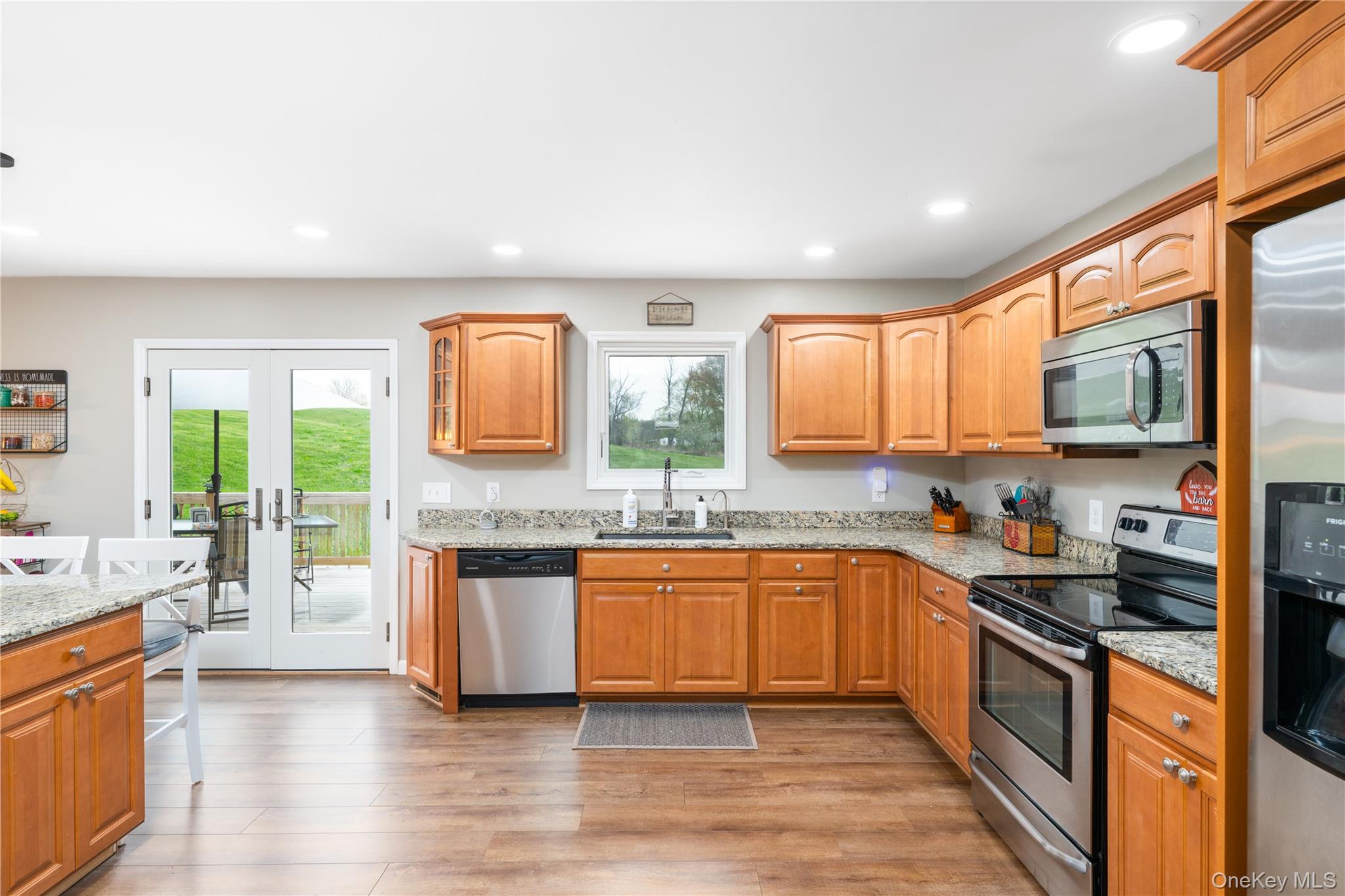 41 Diddell Road Wappingers Falls, NY 12590 - Photo 9 of 44 Kitchen featuring wood flooring, light wood cabinetry, granite countertops, stainless steel appliances, and recessed lighting