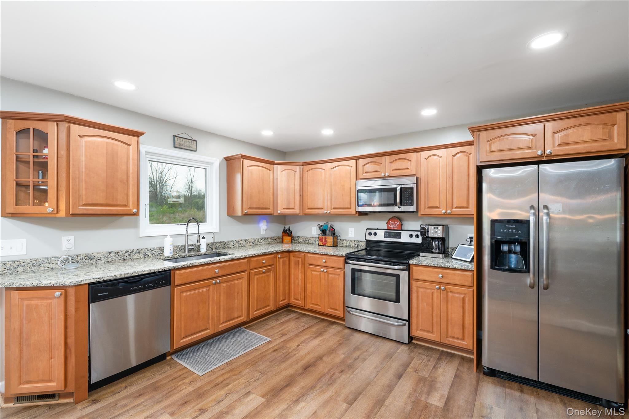 41 Diddell Road Wappingers Falls, NY 12590 - Photo 10 of 44 Kitchen featuring wood cabinetry, stainless steel appliances, granite countertops, wood flooring, and recessed lighting