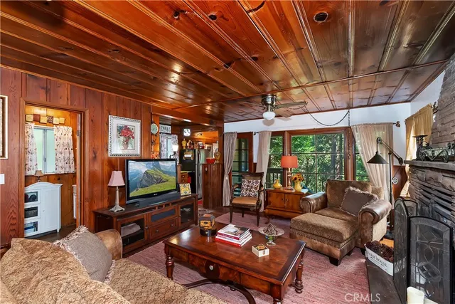 a bathroom with a shower curtain and a window