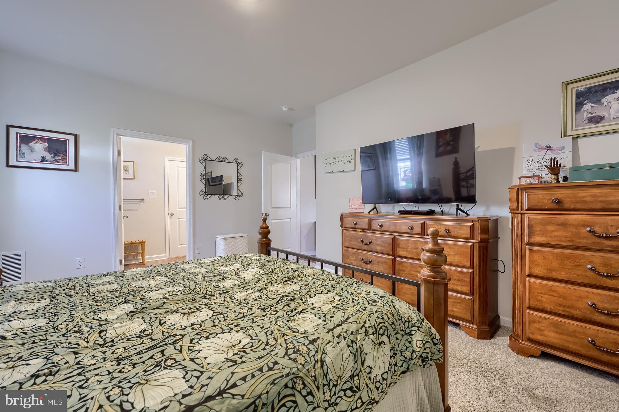6132 Deborah Drive Spring Grove, PA 17362 - Photo 13 of 33 a bedroom with a bed and wooden floor