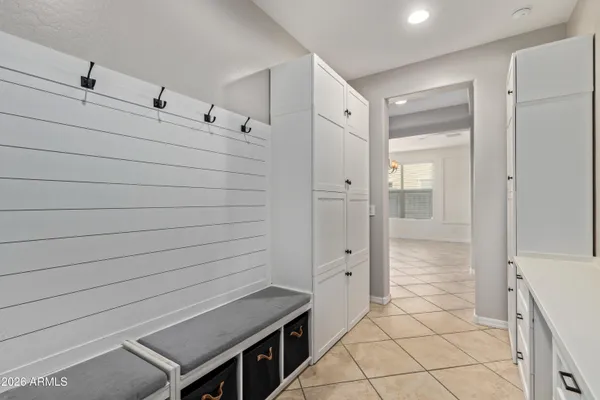 a bathroom with a double vanity sink and mirror
