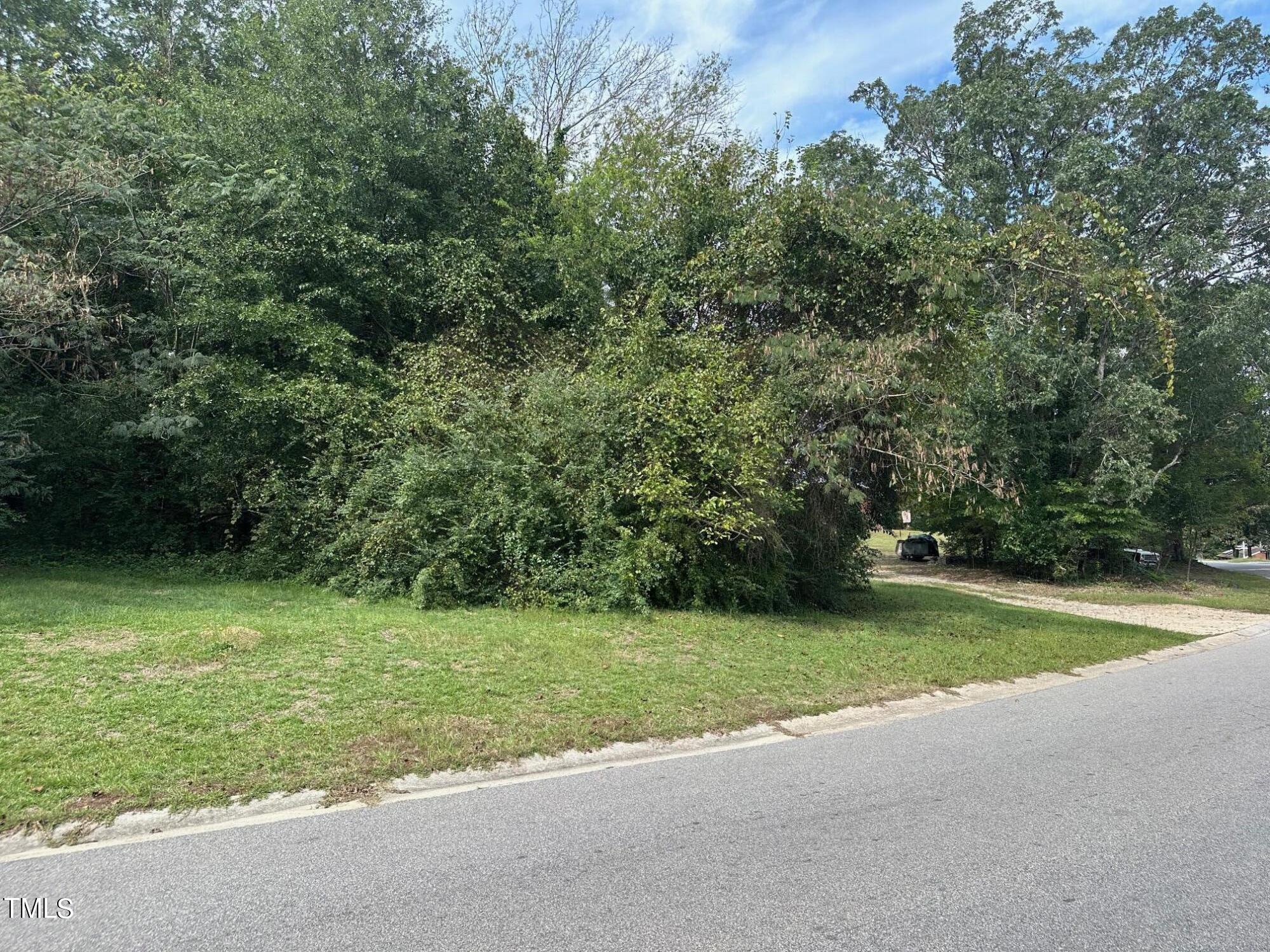 4209 James Road Raleigh, NC 27616 - Photo 5 of 6 a view of a park with large trees