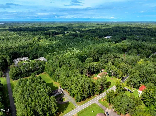 a view of a garden with an outdoor space