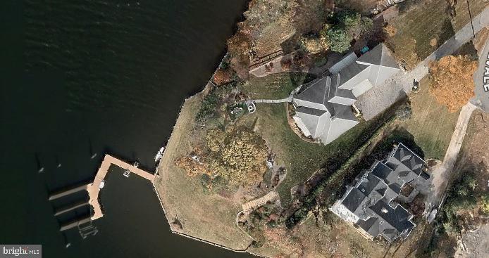 1864 Milvale Road Annapolis, MD 21409 - Photo 1 of 1 an aerial view of a house with a yard