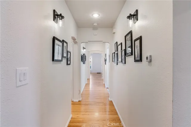 a view of a hallway with a white walls