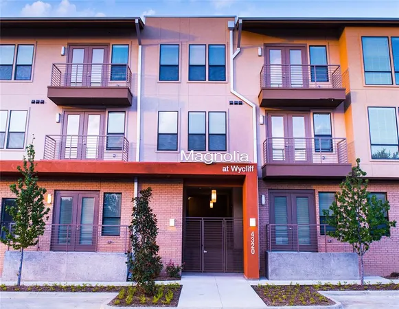 a front view of a multi story residential apartment building
