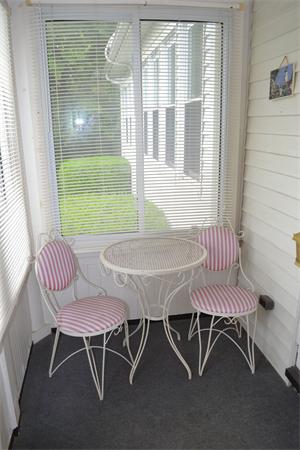 11 Sunset Road Cambridge, MA 02138 - Photo 13 of 18 a view of a dining room with furniture window and outside view