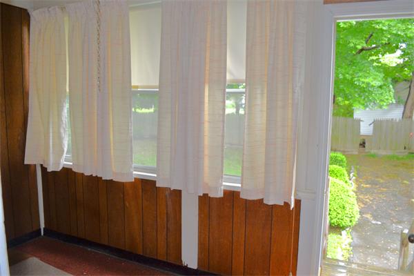 11 Sunset Road Cambridge, MA 02138 - Photo 15 of 18 a view of a balcony with wooden floor
