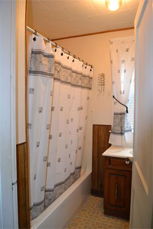 11 Sunset Road Cambridge, MA 02138 - Photo 18 of 18 a bathroom with a sink and a mirror
