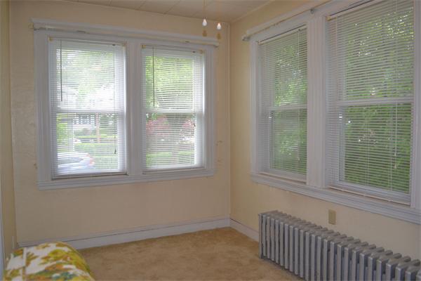 11 Sunset Road Cambridge, MA 02138 - Photo 8 of 18 a view of a bedroom with window