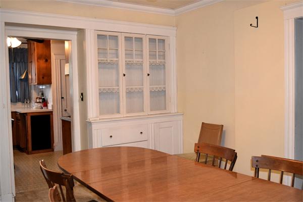 11 Sunset Road Cambridge, MA 02138 - Photo 9 of 18 a view of kitchen with furniture and wooden floor