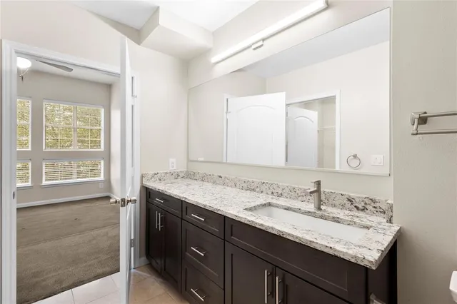 a view of a living room with windows