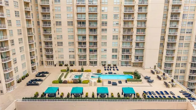 a bathroom with a sink mirror and vanity