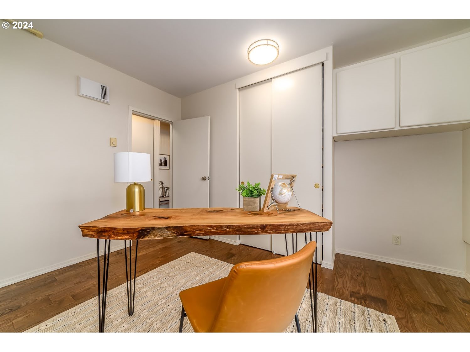 1313 Lincoln Street Eugene, OR 97401 - Photo 21 of 24 a dining room with furniture and wooden floor