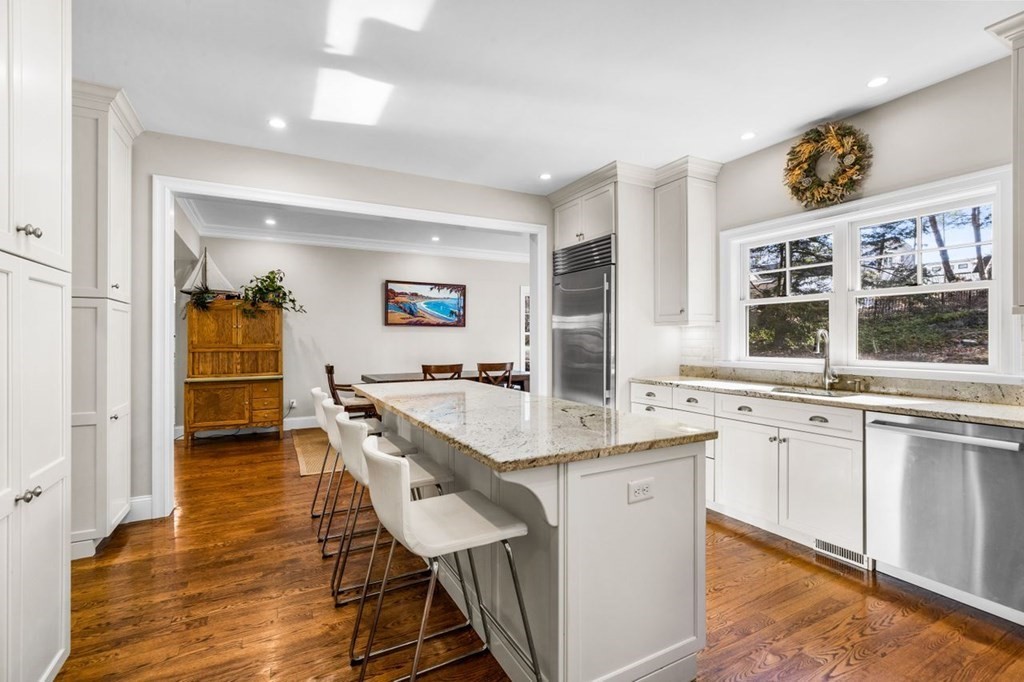 36 Newbrook Circle Newton, MA 02467 - Photo 11 of 29 a kitchen with a sink and cabinets