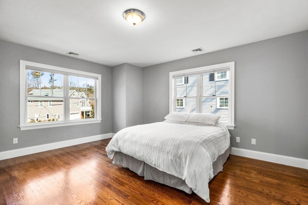 36 Newbrook Circle Newton, MA 02467 - Photo 22 of 29 a bedroom with a bed and window