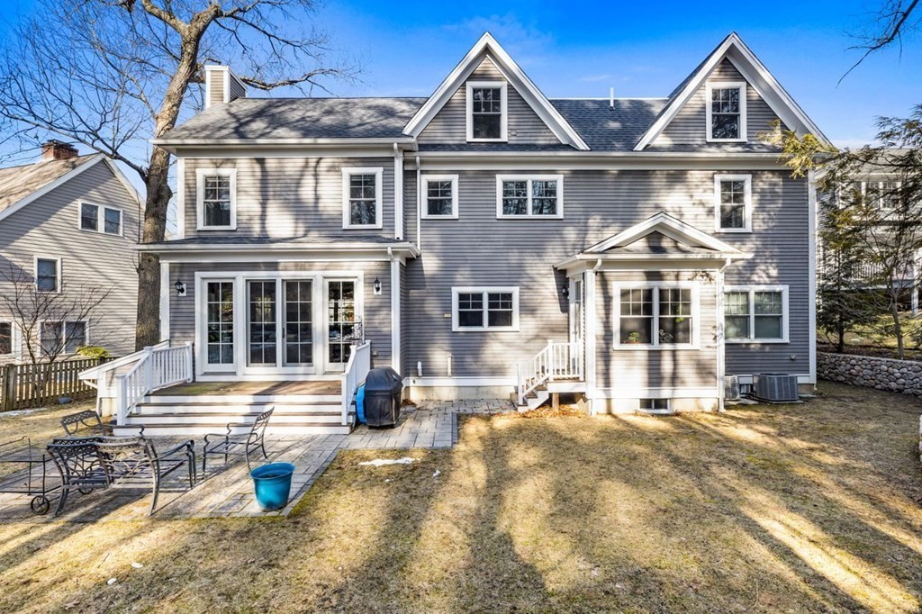 36 Newbrook Circle Newton, MA 02467 - Photo 27 of 29 front view of a house with a yard