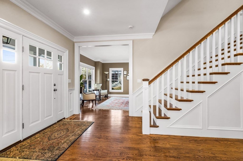 36 Newbrook Circle Newton, MA 02467 - Photo 3 of 29 a view of entryway and hall with wooden floor