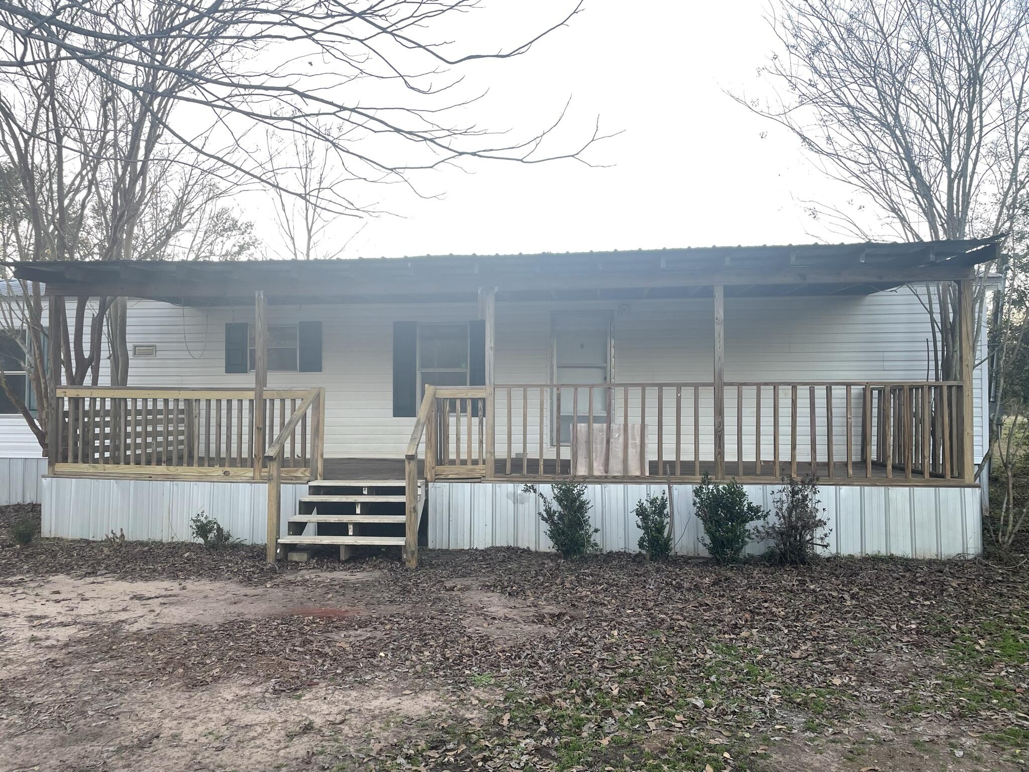 5472 Elzie Road Baker, FL 32531 - Photo 4 of 16 a view of a house with a yard