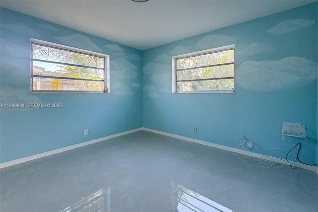 an empty room with a window