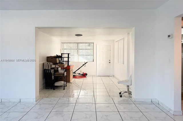a view of a livingroom with lounge chair