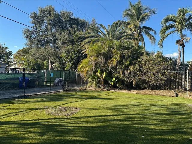 a view of a swimming pool with an outdoor space