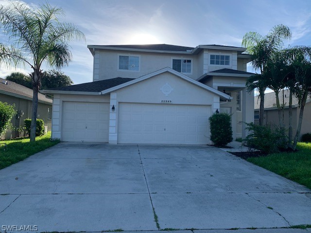 21549 Windham Run Estero, FL 33928 - Photo 1 of 21 a house view with a outdoor space