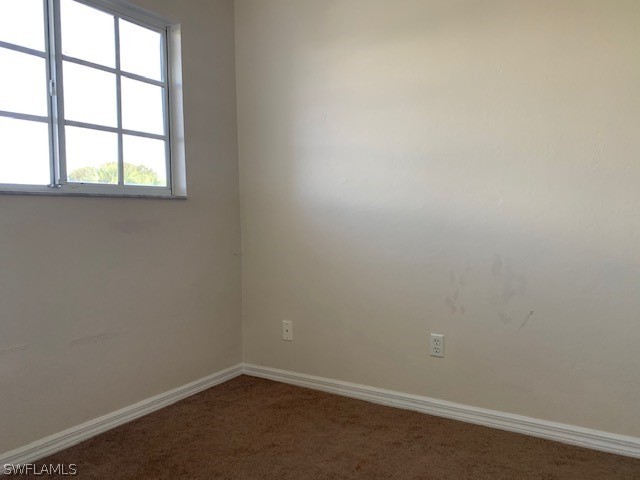 21549 Windham Run Estero, FL 33928 - Photo 12 of 21 an empty room with a window