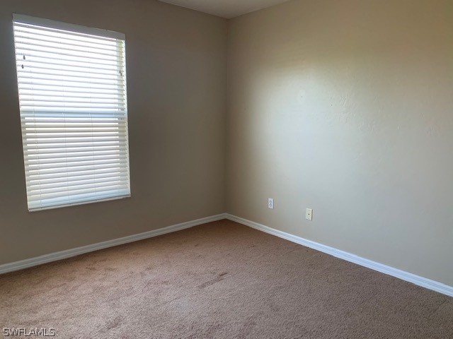 21549 Windham Run Estero, FL 33928 - Photo 15 of 21 an empty room with a window