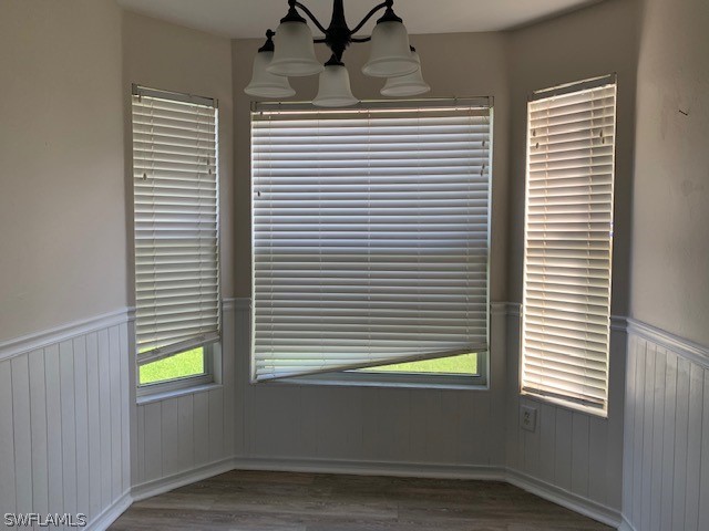 21549 Windham Run Estero, FL 33928 - Photo 6 of 21 a bathroom with a window and a bathtub