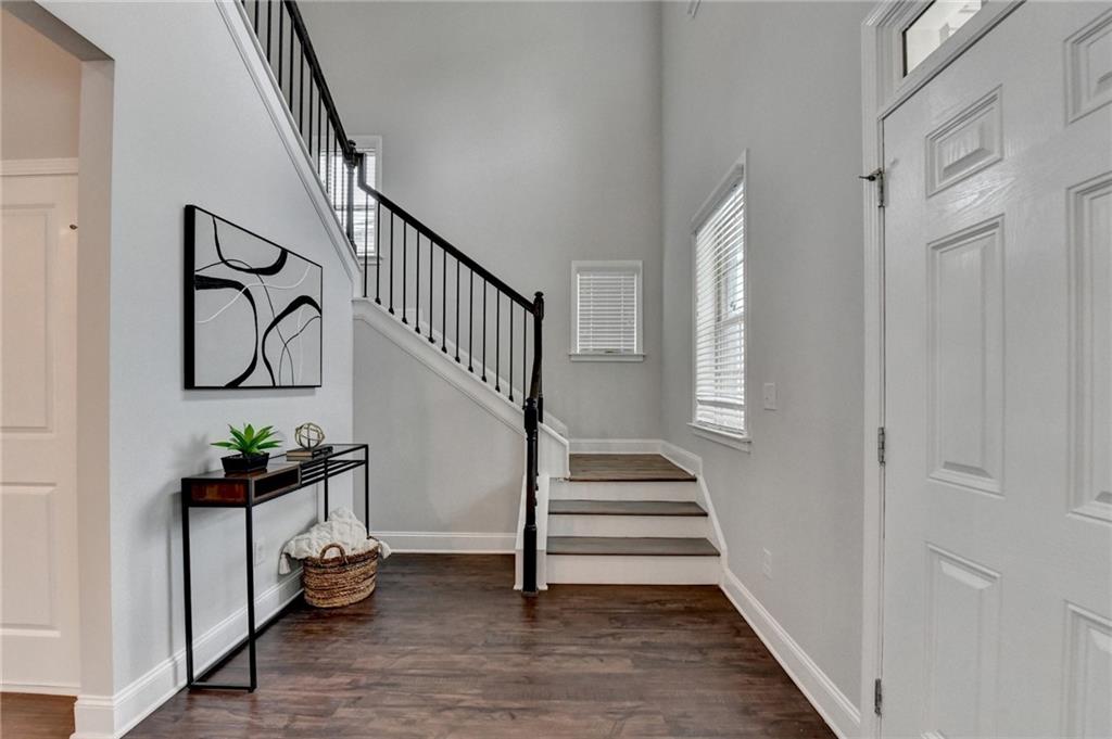 2017 Yvette Way Braselton, GA 30517 - Photo 4 of 75 a view of entryway and hall with wooden floor