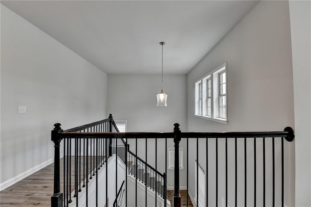 2017 Yvette Way Braselton, GA 30517 - Photo 41 of 75 a view of a hallway view with windows