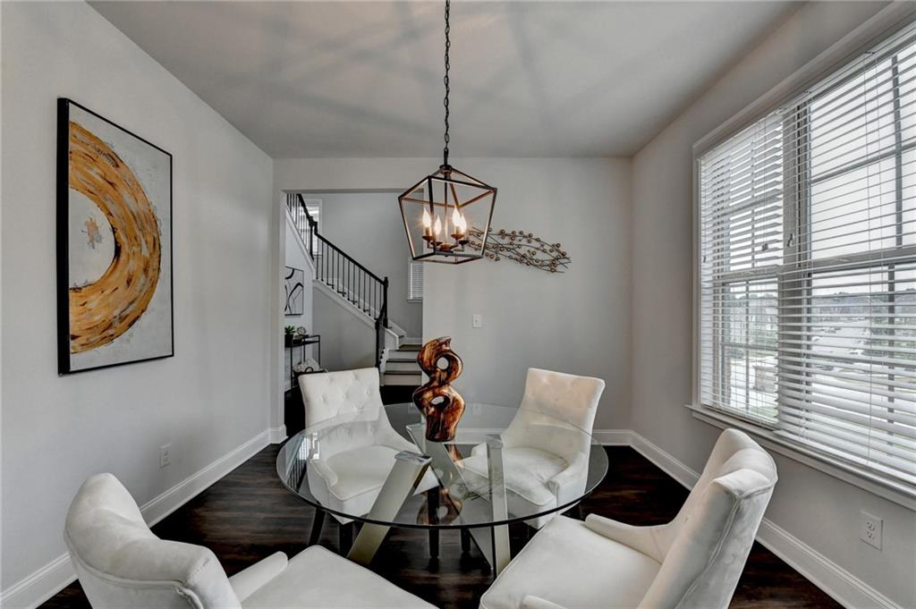 2017 Yvette Way Braselton, GA 30517 - Photo 10 of 75 a dining room with furniture and window