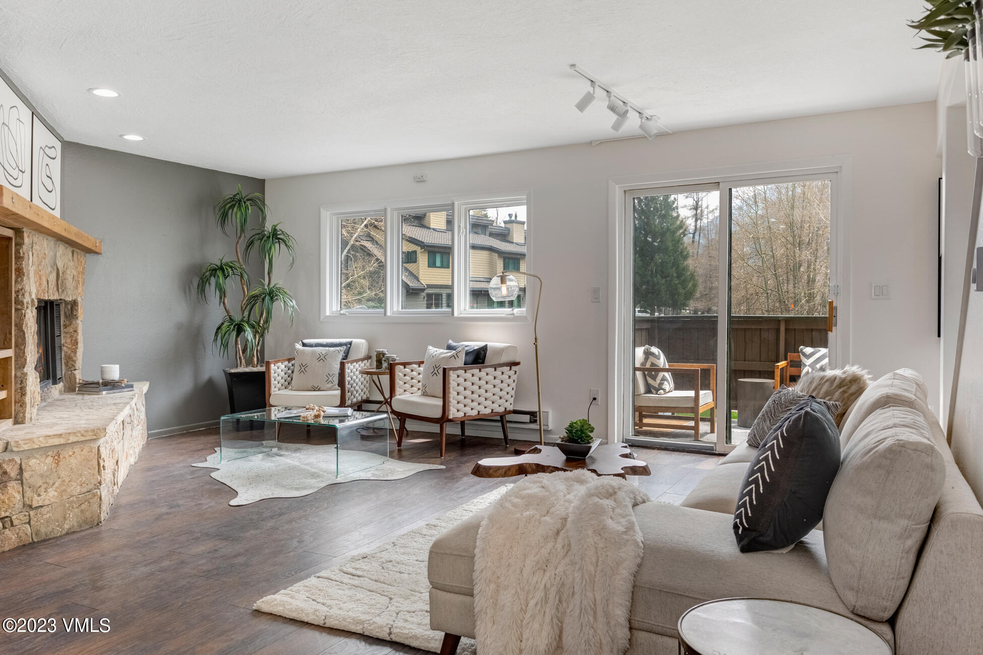 3910 Fall Line Drive, Unit 19 Vail, CO 81657 - Photo 1 of 40 a living room with furniture and a large window