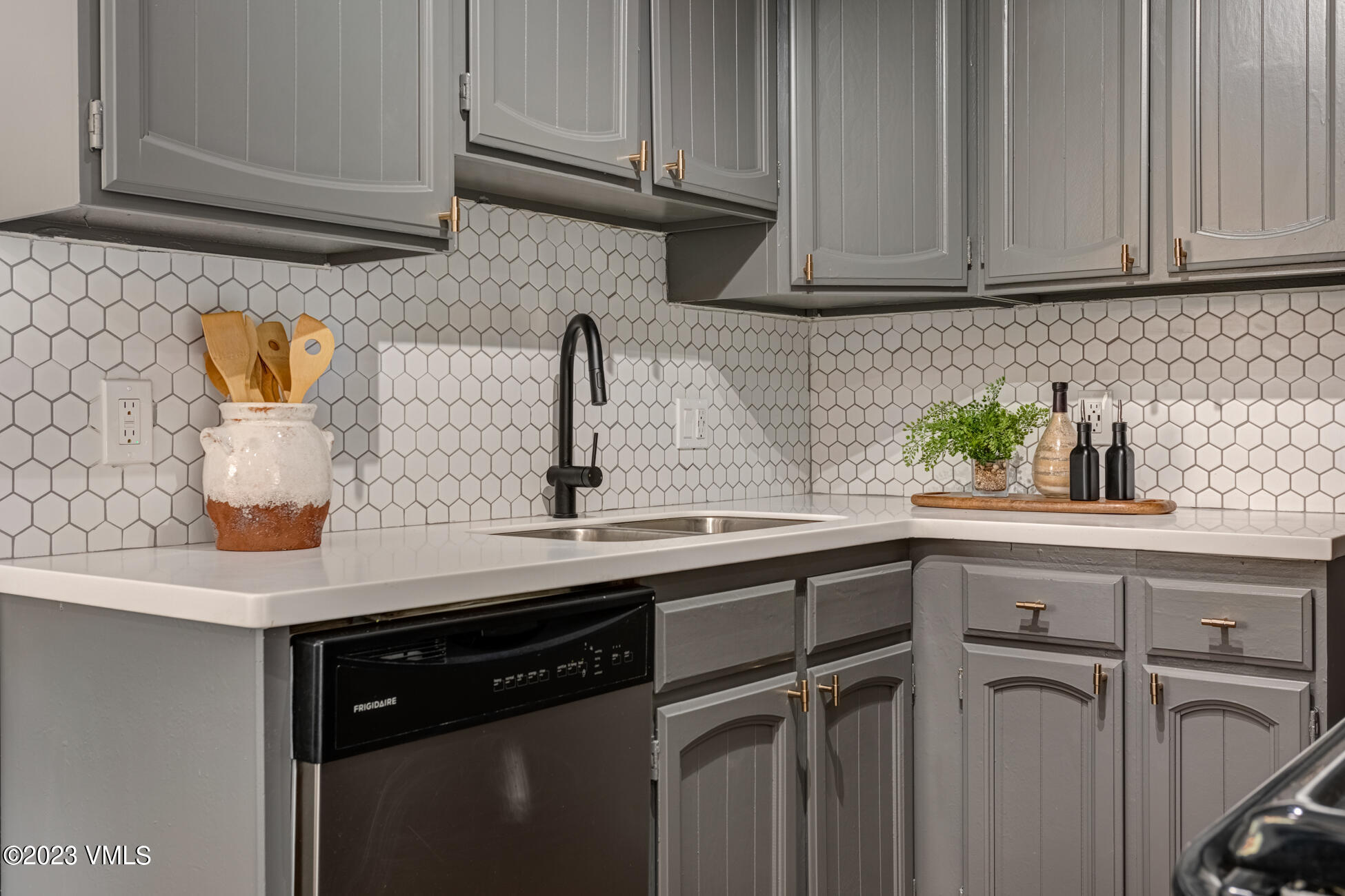 3910 Fall Line Drive, Unit 19 Vail, CO 81657 - Photo 11 of 40 a kitchen with appliances cabinets and a counter top space