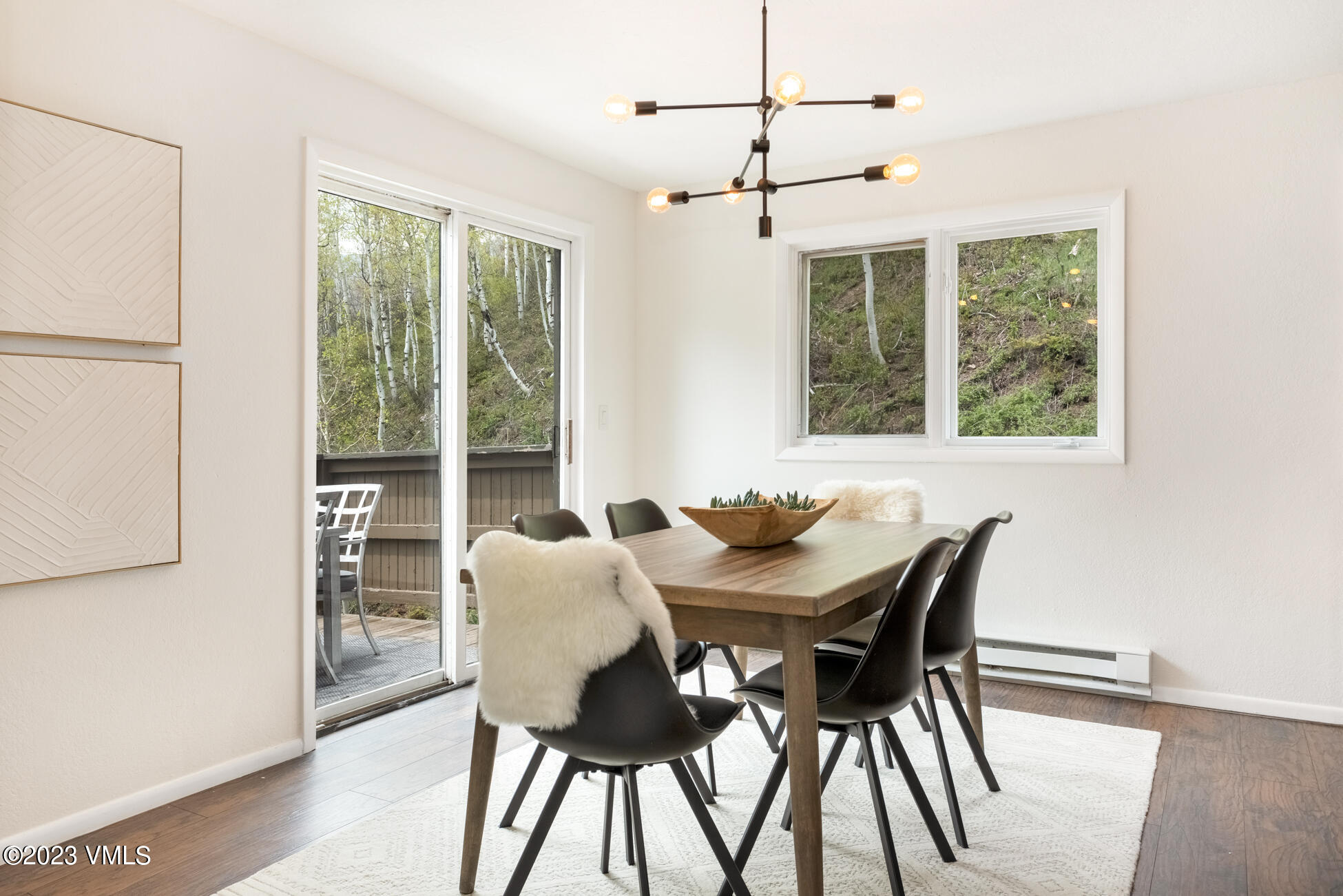 3910 Fall Line Drive, Unit 19 Vail, CO 81657 - Photo 13 of 40 a view of a dining room with furniture window and outside view